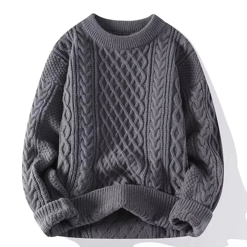 Gray cable knit sweater on a white background