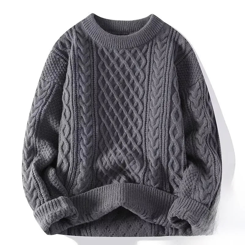 Gray cable knit sweater on a white background
