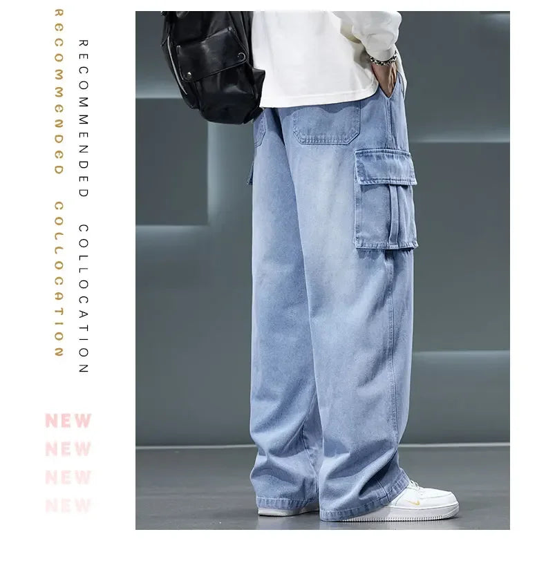 Person wearing light blue cargo pants with a black backpack on a gray background
