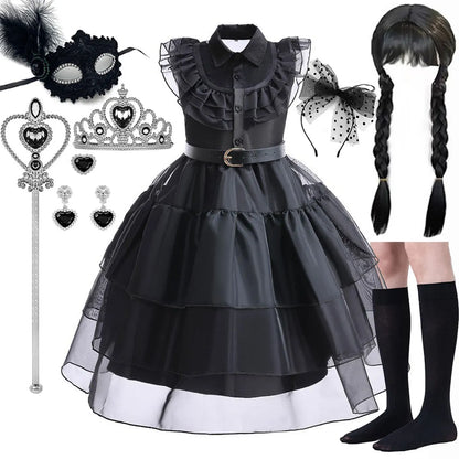 Black and gray dress with accessories on a white background