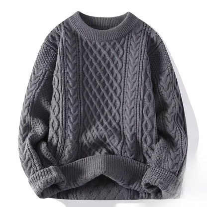 Gray cable knit sweater on a white background