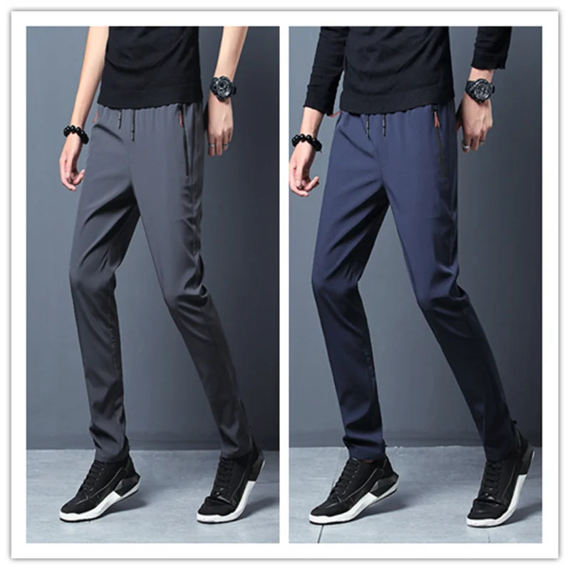 Two sets of pants shown side by side against a gray background